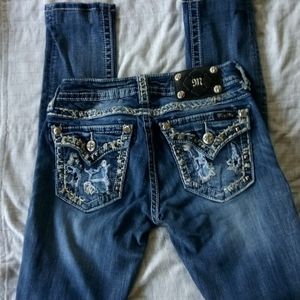 Miss Me skinny jeans, factory distressing